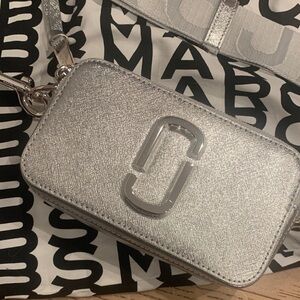 Marc Jacob’s snapshot metallic leather cross body bag